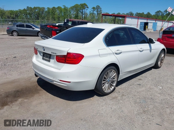 2013 BMW 3 Series 328i xDrive with VIN WBA3B5C51DJ599144, listed as a IAAI auction lot 42059260 with 84,153 mi miles. Bid and sale history available at carsss.com. Image 4.
