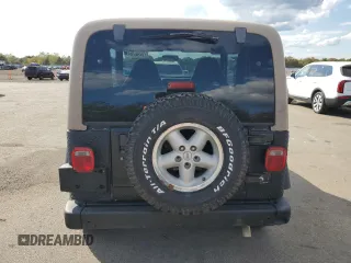 1999 Jeep Wrangler Sport z VIN 1J4FY19SXXP465037, wystawiony jako Copart lot #54772405 z przebiegiem 50 942 mil mil oraz Nie do naprawy • Non repairable. Historia ofert i sprzedaży dostępna na DreamBid. Obrazek 6.