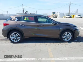 2018 Infiniti QX30 Premium with VIN SJKCH5CP5JA054091, listed as a IAAI auction lot 42471932 with 28,713 mi miles and . Bid and sale history available at DreamBid. Image 14.