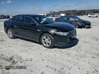 2014 Ford Taurus SEL z VIN 1FAHP2E82EG150298, wystawiony jako Copart lot #49546245 z przebiegiem 147 956 mil mil oraz Szkoda całkowita • Salvage title. Historia ofert i sprzedaży dostępna na DreamBid. Obrazek 10.