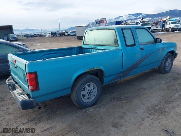1995 Dodge Dakota with VIN 1B7GL23X3SW916018, listed as a IAAI auction lot 41722690 with 128,385 mi miles. Bid and sale history available at carsss.com. Image 4.
