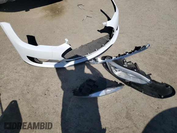 2013 Tesla Model S with VIN 5YJSA1AC7DFP10881, listed as a Copart auction lot 61485235 with 107,032 mi miles and Salvage title. Bid and sale history available at DreamBid. Image 12.