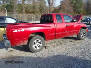 2006 Dodge Dakota SLT with VIN 1D7HW42N16S525329, listed as a IAAI auction lot 40920101 with 124,535 mi miles and . Bid and sale history available at carsss.com. Image 4.