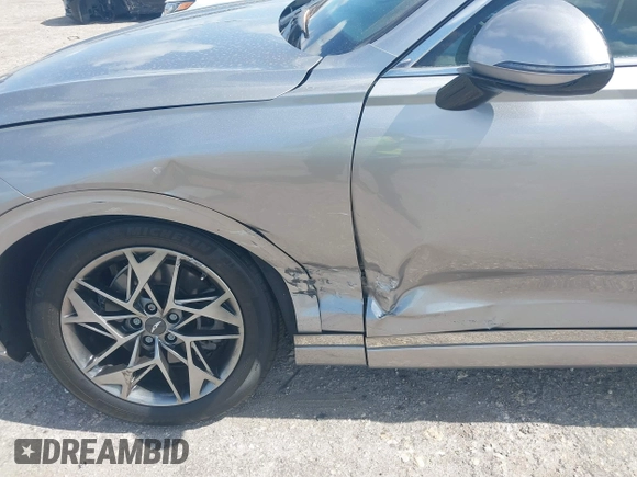 2022 Genesis GV70 2.5T с VIN KMUMADTB4NU059911, выставлен на аукционе IAAI как лот 42149577 с пробегом 22 070 миль миль и . История ставок и продаж доступна на DreamBid. Изображение 6.