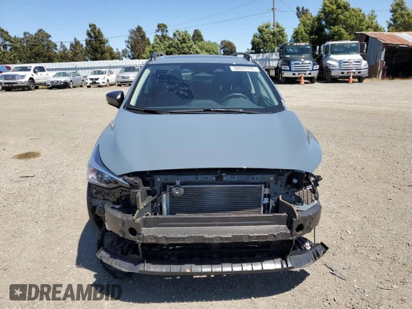 2024 Subaru Crosstrek Premium with VIN JF2GUADC0R8902676, listed as a Copart auction lot 56603795 with 9,129 mi miles and Salvage title. Bid and sale history available at DreamBid. Image 5.