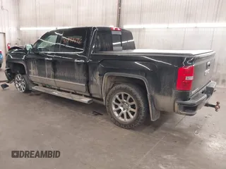 2015 GMC Sierra 1500 Denali with VIN 3GTU2WEC7FG129925, listed as a IAAI auction lot 41731496 with 165,168 mi miles. Bid and sale history available at carsss.com. Image 3.