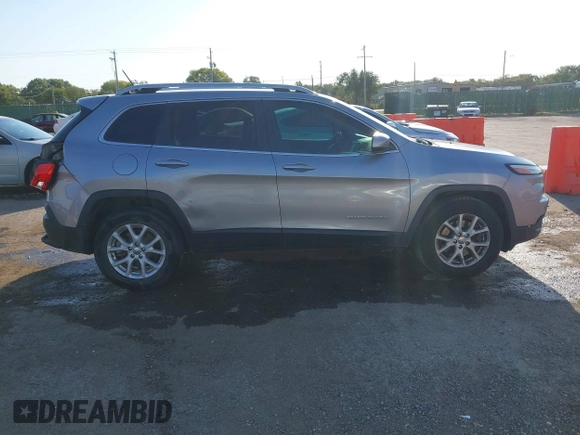 2016 Jeep Cherokee Latitude with VIN 1C4PJMCB5GW218166, listed as a IAAI auction lot 40458497 with 145,272 mi miles and . Bid and sale history available at carsss.com. Image 13.