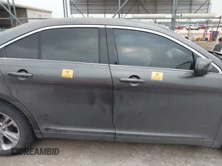 2015 Ford Taurus SEL z VIN 1FAHP2E85FG209085, wystawiony jako IAAI lot #41944532 z przebiegiem 143 850 mil mil oraz . Historia ofert i sprzedaży dostępna na DreamBid. Obrazek 13.