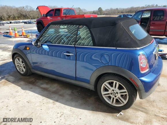 2014 MINI Cooper Convertible with VIN WMWZN3C50ET569810, listed as a Copart auction lot 43417525 with 55,444 mi miles and Salvage Title. Bid and sale history available at carsss.com. Image 2.