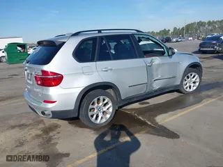 2011 BMW X5 35i with VIN 5UXZV4C5XBL412661, listed as a IAAI auction lot 41810470 with 168,470 mi miles. Bid and sale history available at carsss.com. Image 4.