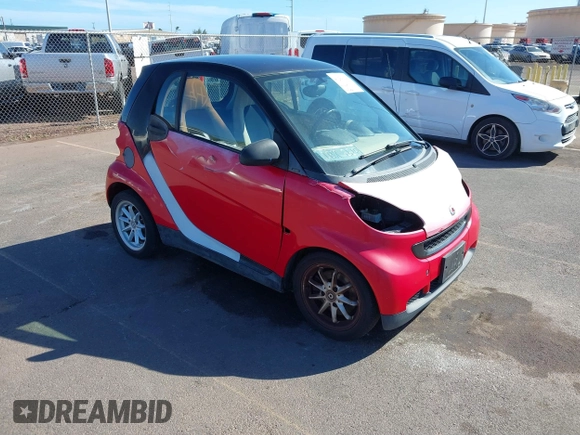2009 Smart fortwo Pure z VIN WMEEJ31XX9K219695, wystawiony jako IAAI lot #41280141 z przebiegiem 93 896 mil mil oraz . Historia ofert i sprzedaży dostępna na DreamBid. Obrazek 1.