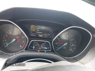 2016 Ford Focus SE with VIN 1FADP3F26GL351775, listed as a IAAI auction lot 42424733 with 164,886 mi miles and . Bid and sale history available at DreamBid. Image 7.