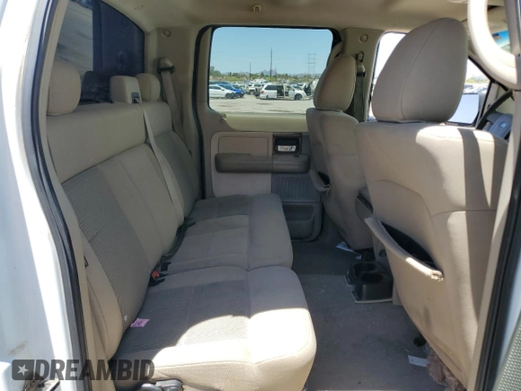 2006 Ford F-150 XLT с VIN 1FTRW12W16KB23901, выставлен на аукционе Copart как лот 61093795 с пробегом 164 084 миль миль и Списание • Salvage title. История ставок и продаж доступна на DreamBid. Изображение 10.