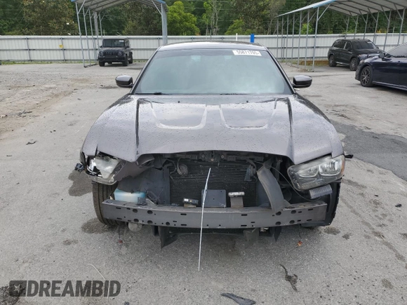 2014 Dodge Charger SXT z VIN 2C3CDXHGXEH261414, wystawiony jako Copart lot #55871705 z przebiegiem 221 000 mil mil oraz Szkoda całkowita • Salvage title. Historia ofert i sprzedaży dostępna na DreamBid. Obrazek 5.