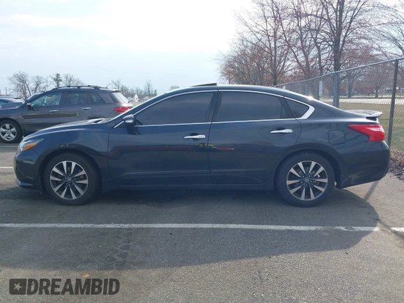 2016 Nissan Altima SR with VIN 1N4AL3AP3GC292783, listed as a IAAI auction lot 41876267 with 128,013 mi miles and . Bid and sale history available at carsss.com. Image 14.