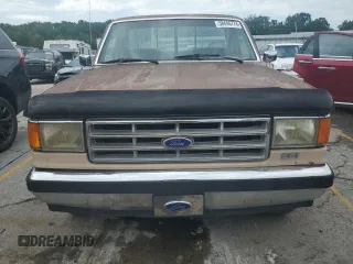 1987 Ford F-150 with VIN 2FTEF15H8HCA66731, listed as a Copart auction lot 58696774 with 81,683 mi miles and Salvage Title. Bid and sale history available at carsss.com. Image 5.