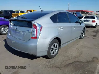 2013 Toyota Prius One with VIN JTDKN3DU1D5650005, listed as a IAAI auction lot 42040252 with 88,286 mi miles. Bid and sale history available at carsss.com. Image 4.
