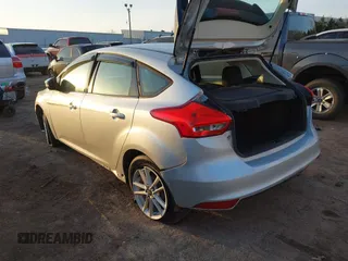 2015 Ford Focus SE with VIN 1FADP3K22FL282457, listed as a IAAI auction lot 41872989 with 98,590 mi miles. Bid and sale history available at carsss.com. Image 3.