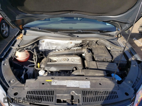 2016 Volkswagen Tiguan S with VIN WVGBV7AX7GW597813, listed as a Copart auction lot 88015075 with 73,544 mi miles and Salvage Title. Bid and sale history available at DreamBid. Image 12.