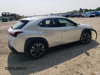 2025 Lexus UX 300h with VIN JTHUCJDH3S2000210, listed as a Copart auction lot 60677575 with 18,329 mi miles and Salvage title. Bid and sale history available at DreamBid. Image 3.