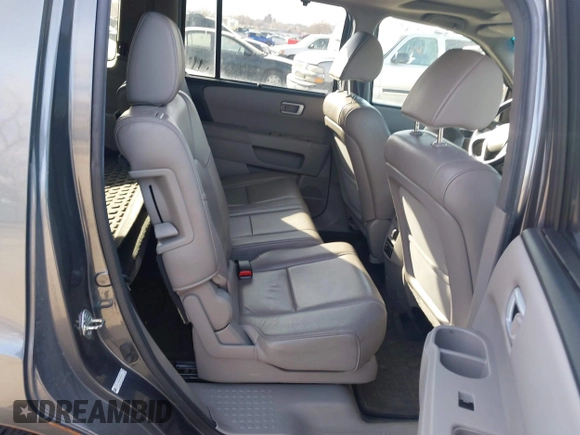 2013 Honda Pilot Touring with VIN 5FNYF4H94DB035692, listed as a IAAI auction lot 41771116 with 137,464 mi miles and . Bid and sale history available at carsss.com. Image 8.