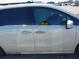 2019 Honda Odyssey Elite with VIN 5FNRL6H99KB091617, listed as a IAAI auction lot 41719807 with 93,775 mi miles and . Bid and sale history available at DreamBid. Image 14.