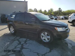 2010 Dodge Journey SXT with VIN 3D4PH5FV6AT139385, listed as a Copart auction lot 52531735 with Not Provided miles and Non Repairable. Bid and sale history available at DreamBid. Image 4.