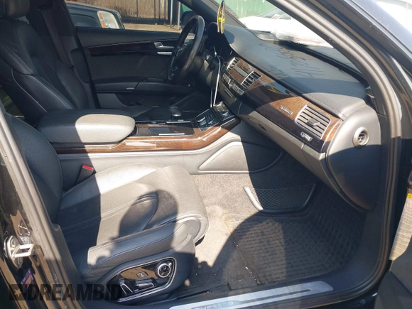 2017 Audi A8 with VIN WAU44AFDXHN004395, listed as a IAAI auction lot 41705688 with 63,282 mi miles and . Bid and sale history available at DreamBid. Image 5.