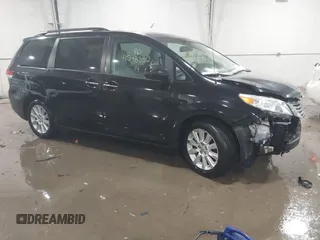 2014 Toyota Sienna Ltd with VIN 5TDDK3DC7ES072058, listed as a IAAI auction lot 41548332 with 153,742 mi miles. Bid and sale history available at carsss.com. Image 1.