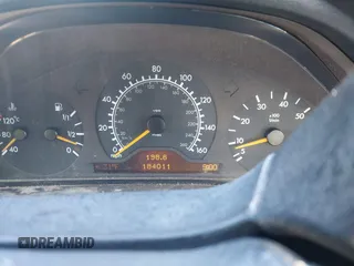 1999 Mercedes-Benz E-Class with VIN WDBJF82H0XX015778, listed as a IAAI auction lot 41269886 with 184,011 mi miles. Bid and sale history available at carsss.com. Image 7.