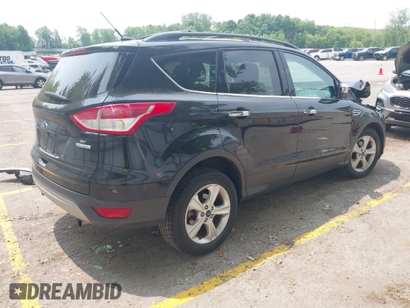 2013 Ford Escape SE with VIN 1FMCU0GX0DUC64074, listed as a IAAI auction lot 42419711 with 91,808 mi miles and . Bid and sale history available at DreamBid. Image 4.