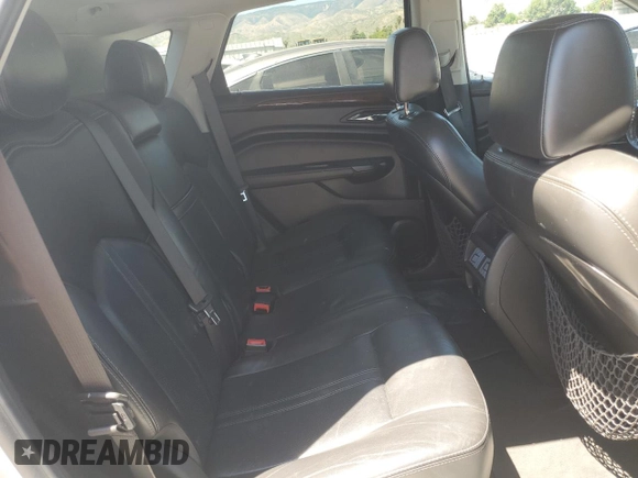 2015 Cadillac SRX Performance Collection with VIN 3GYFNFE31FS595552, listed as a Copart auction lot 55849145 with 149,601 mi miles and Salvage title. Bid and sale history available at DreamBid. Image 11.