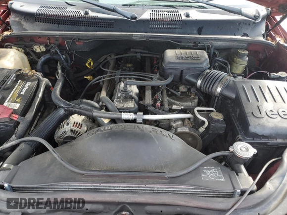 2004 Jeep Grand Cherokee Laredo z VIN 1J4GX48S24C348436, wystawiony jako Copart lot #61930385 z przebiegiem 97 536 mil mil oraz Szkoda całkowita • Salvage title. Historia ofert i sprzedaży dostępna na DreamBid. Obrazek 11.