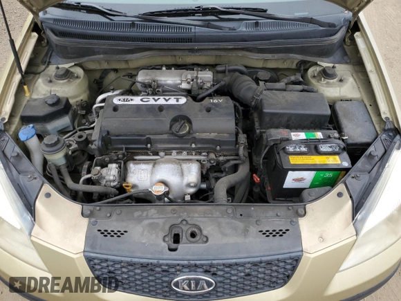 2009 Kia Rio LX with VIN KNADE223496549097, listed as a Copart auction lot 54375975 with 140,882 mi miles and Salvage Title. Bid and sale history available at DreamBid. Image 11.