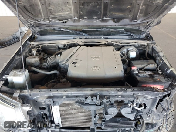 2014 Toyota Tacoma PreRunner z VIN 3TMJU4GN4EM166687, wystawiony jako Copart lot #62021545 z przebiegiem 81 427 mil mil oraz Szkoda całkowita • Salvage title. Historia ofert i sprzedaży dostępna na DreamBid. Obrazek 11.