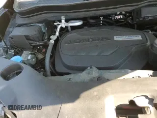 2019 Honda Pilot Elite z VIN 5FNYF6H08KB063828, wystawiony jako Copart lot #71307255 z przebiegiem 93 860 mil mil oraz Szkoda całkowita • Salvage title. Historia ofert i sprzedaży dostępna na DreamBid. Obrazek 14.