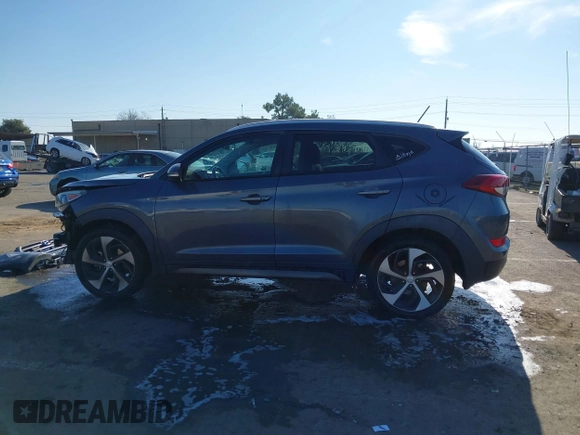 2016 Hyundai Tucson Limited with VIN KM8J33A22GU231834, listed as a IAAI auction lot 41312526 with 117,423 mi miles. Bid and sale history available at carsss.com. Image 15.