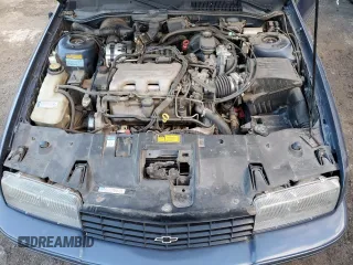1996 Chevrolet Beretta z VIN 1G1LV15M8TY185316, wystawiony jako Copart lot #76835634 z przebiegiem 87 232 mil mil oraz Szkoda całkowita • Salvage title. Historia ofert i sprzedaży dostępna na DreamBid. Obrazek 11.