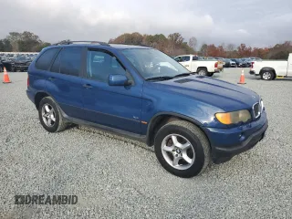 2001 BMW X5 3.0i with VIN WBAFA53521LP22241, listed as a Copart auction lot 79706624 with 145,145 mi miles and Salvage Title. Bid and sale history available at carsss.com. Image 4.