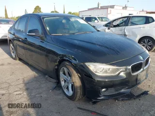 2015 BMW 3 Series 328i with VIN WBA3C1C55FK119562, listed as a IAAI auction lot 41945606 with 51,922 mi miles and . Bid and sale history available at carsss.com. Image 1.
