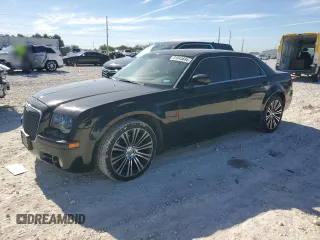 2010 Chrysler 300 with VIN 2C3CA2CV0AH279836, listed as a Copart auction lot 81843694 with 128,515 mi miles and Salvage Title. Bid and sale history available at carsss.com. Image 1.