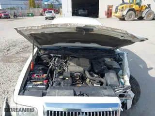 2010 Mercury Grand Marquis LS with VIN 2MEBM7FV7AX611959, listed as a IAAI auction lot 41980176 with 112,885 mi miles. Bid and sale history available at carsss.com. Image 10.