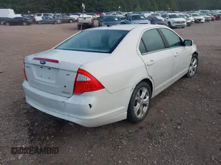 2012 Ford Fusion SE z VIN 3FAHP0HG3CR445925, wystawiony jako IAAI lot #42664342 z przebiegiem 194 798 mil mil oraz . Historia ofert i sprzedaży dostępna na DreamBid. Obrazek 4.