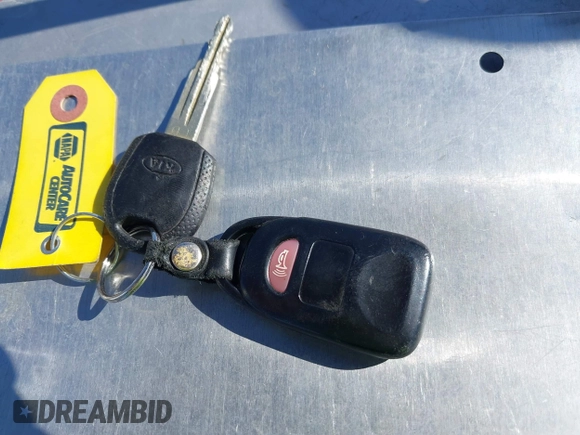 2005 Kia Sportage LX with VIN KNDJF723457057402, listed as a IAAI auction lot 41471742 with 215,565 mi miles and . Bid and sale history available at carsss.com. Image 11.