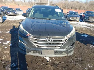 2016 Hyundai Tucson SE with VIN KM8J3CA42GU076476, listed as a IAAI auction lot 41272580 with 112,010 mi miles. Bid and sale history available at carsss.com. Image 12.