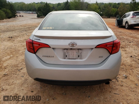 2019 Toyota Corolla L with VIN 5YFBURHE5KP910088, listed as a Copart auction lot 52401885 with 130,124 mi miles and Salvage Title. Bid and sale history available at DreamBid. Image 6.
