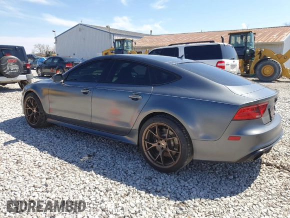 2015 Audi RS 7 Prestige z VIN WUAW2AFC8FN900610, wystawiony jako Copart lot #50708225 z przebiegiem 103 811 mil mil oraz Szkody całkowita. Historia ofert i sprzedaży dostępna na DreamBid. Obrazek 2.