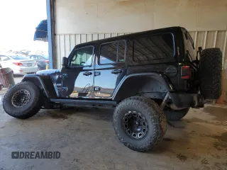 2020 Jeep Wrangler Unlimited Recon with VIN 1C4HJXFN0LW263201, listed as a Copart auction lot 79129424 with 73,405 mi miles and Salvage title. Bid and sale history available at DreamBid. Image 2.