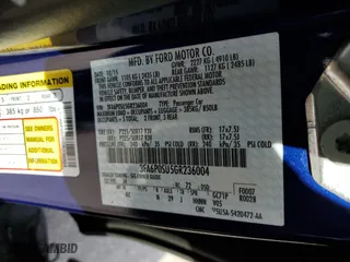 2016 Ford Fusion Energi Titanium with VIN 3FA6P0SU5GR236004, listed as a Copart auction lot 69173462 with 56,099 mi miles. Bid and sale history available at carsss.com. Image 12.