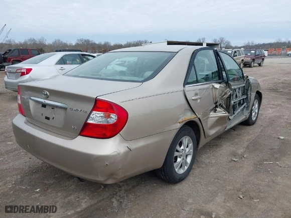 2004 Toyota Camry LE with VIN 4T1BF32K54U569041, listed as a IAAI auction lot 41606355 with 272,432 mi miles. Bid and sale history available at carsss.com. Image 4.